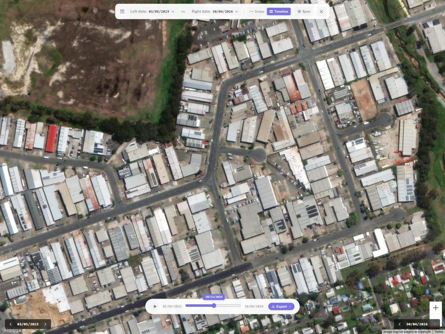RoofMate Imagery Date pill in the map workspace, showing a dropdown of Esri Wayback release dates with one selected and the satellite imagery swapped to match